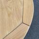 Table à manger scandinave ronde extensible décapée en chêne brut 1970