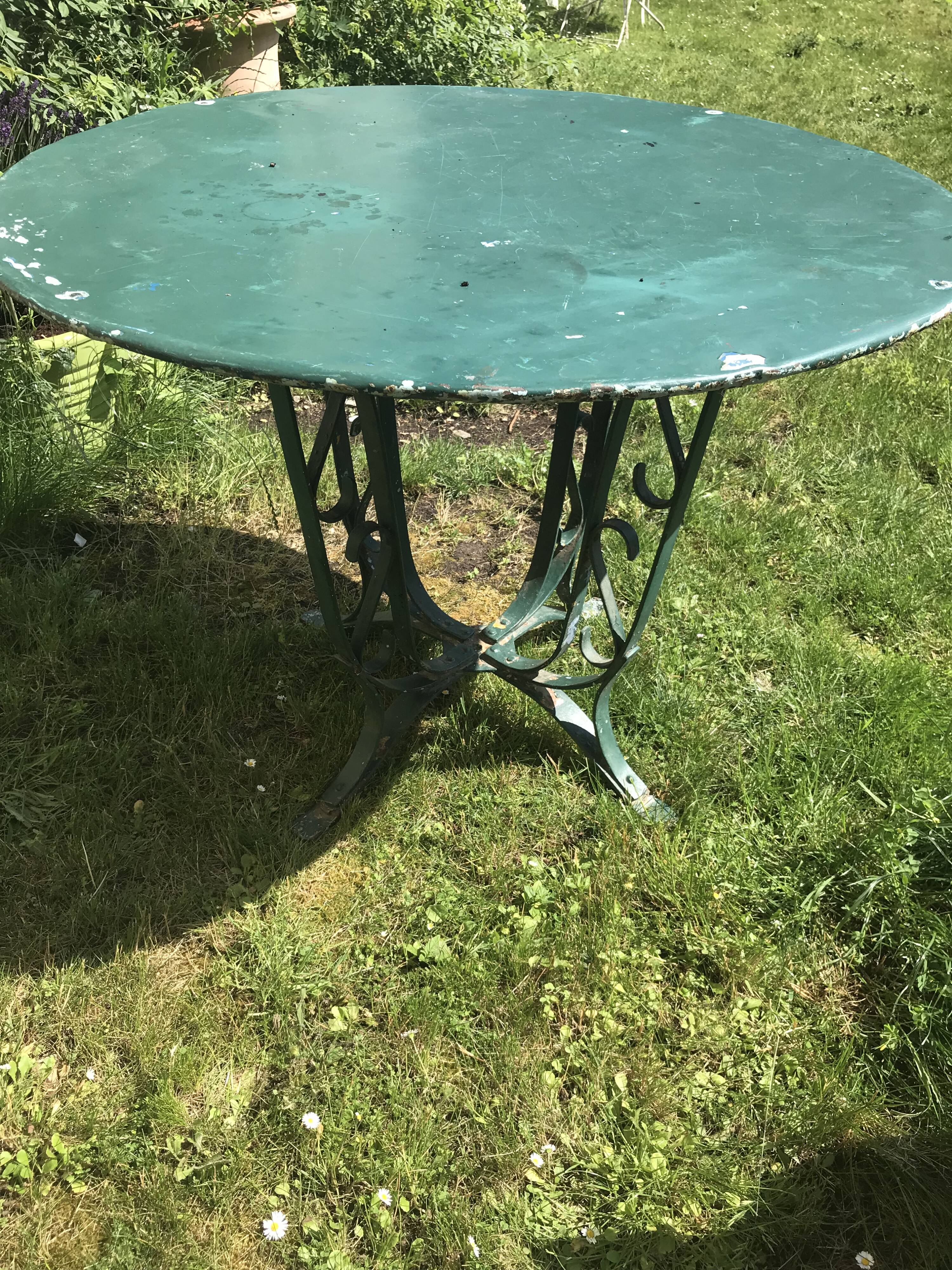 large antique iron table riveted