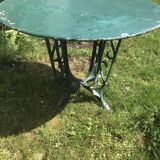 large antique iron table riveted
