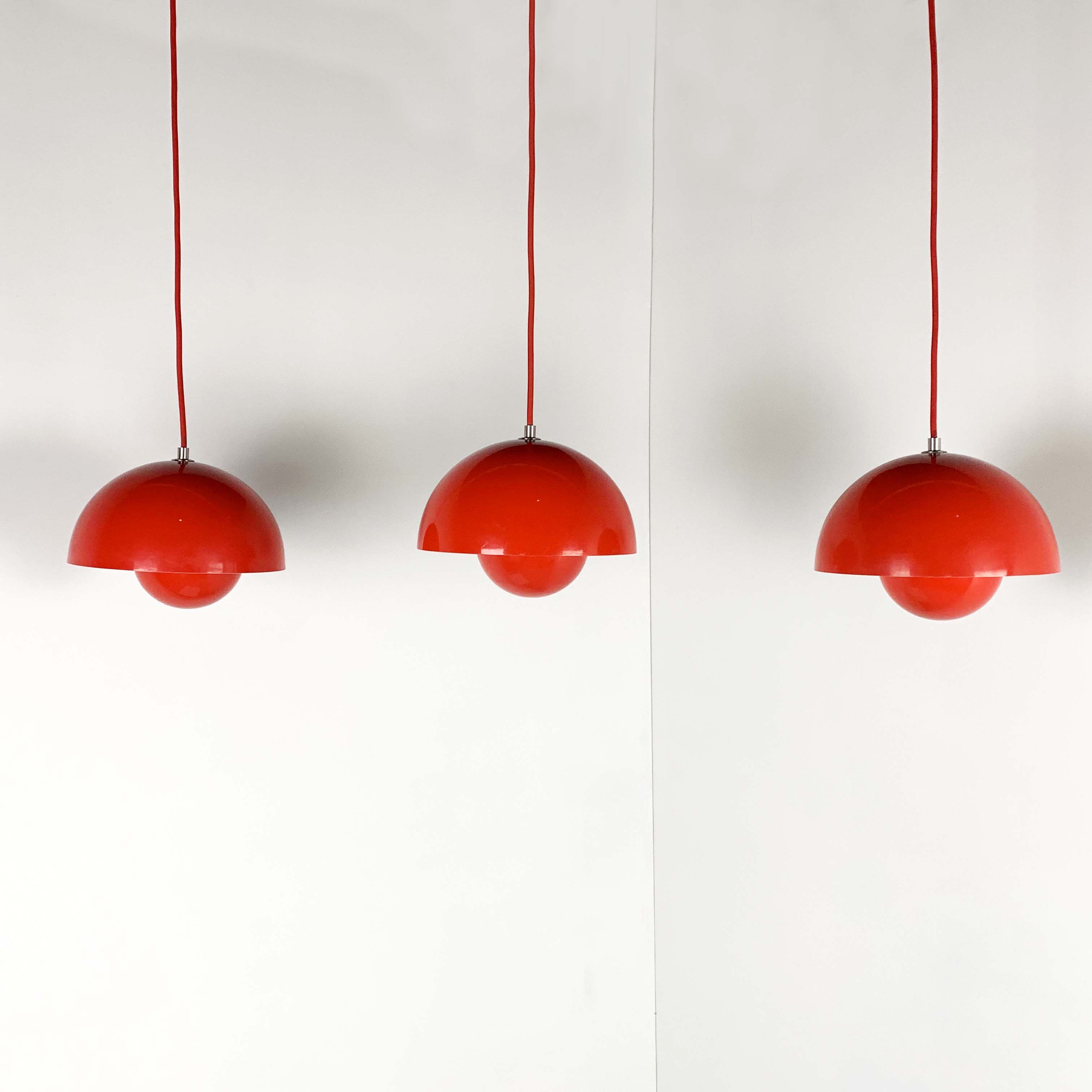 Red flowerpot hanging lamp by Verner Panton