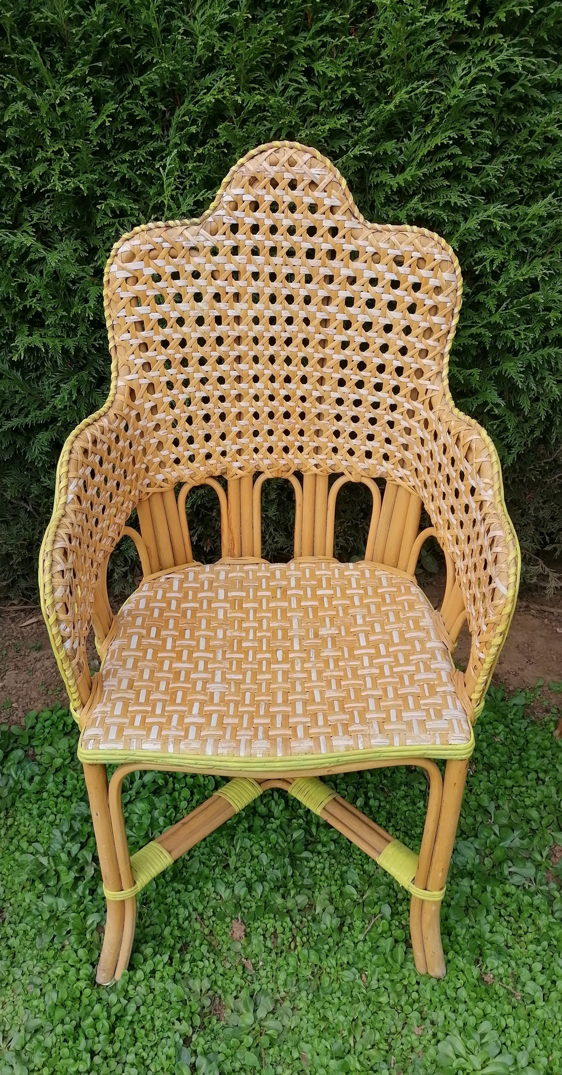 3 woven rattan armchairs