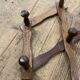 Extendable wooden wall-mounted coat rack