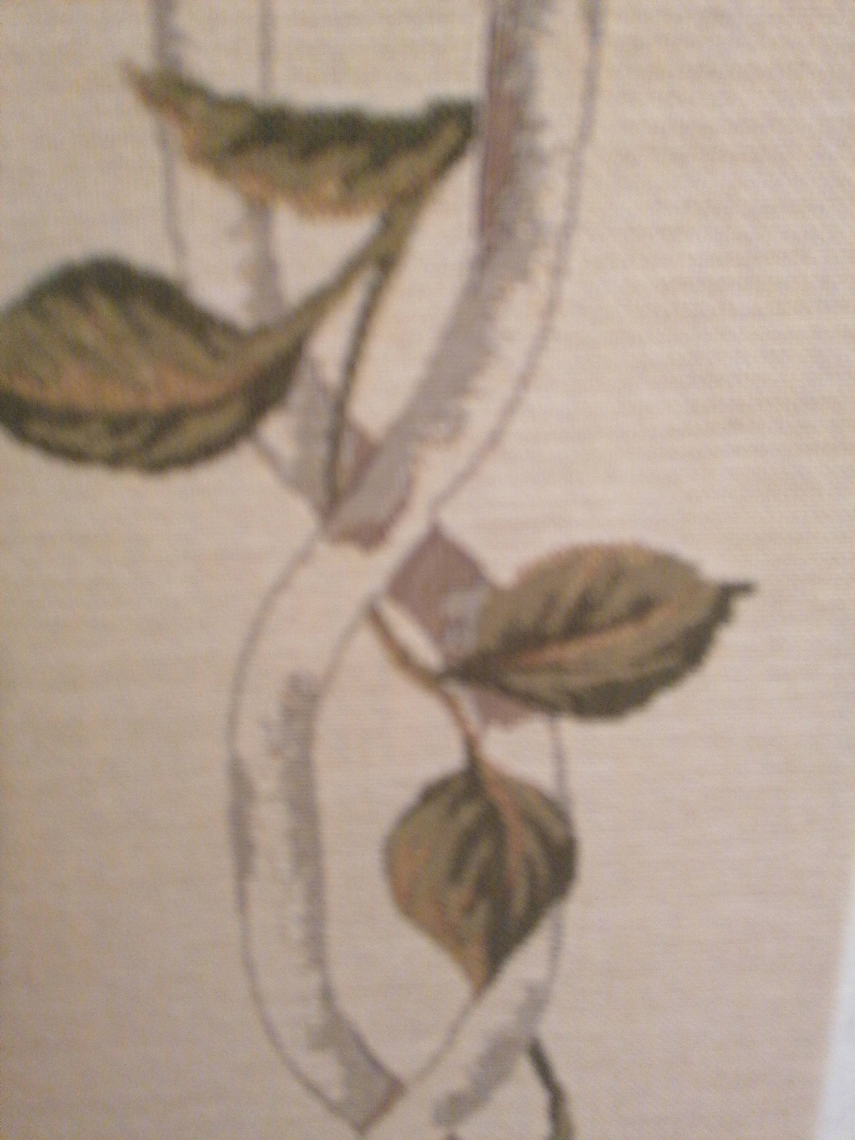 Tapestry of foliage in a Medici vase