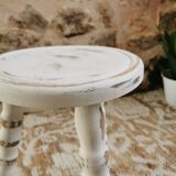 Tripod stool with patinated plant holder