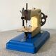 "Marie-José" sewing machine in metal and plastic, children's toy from the 1950s