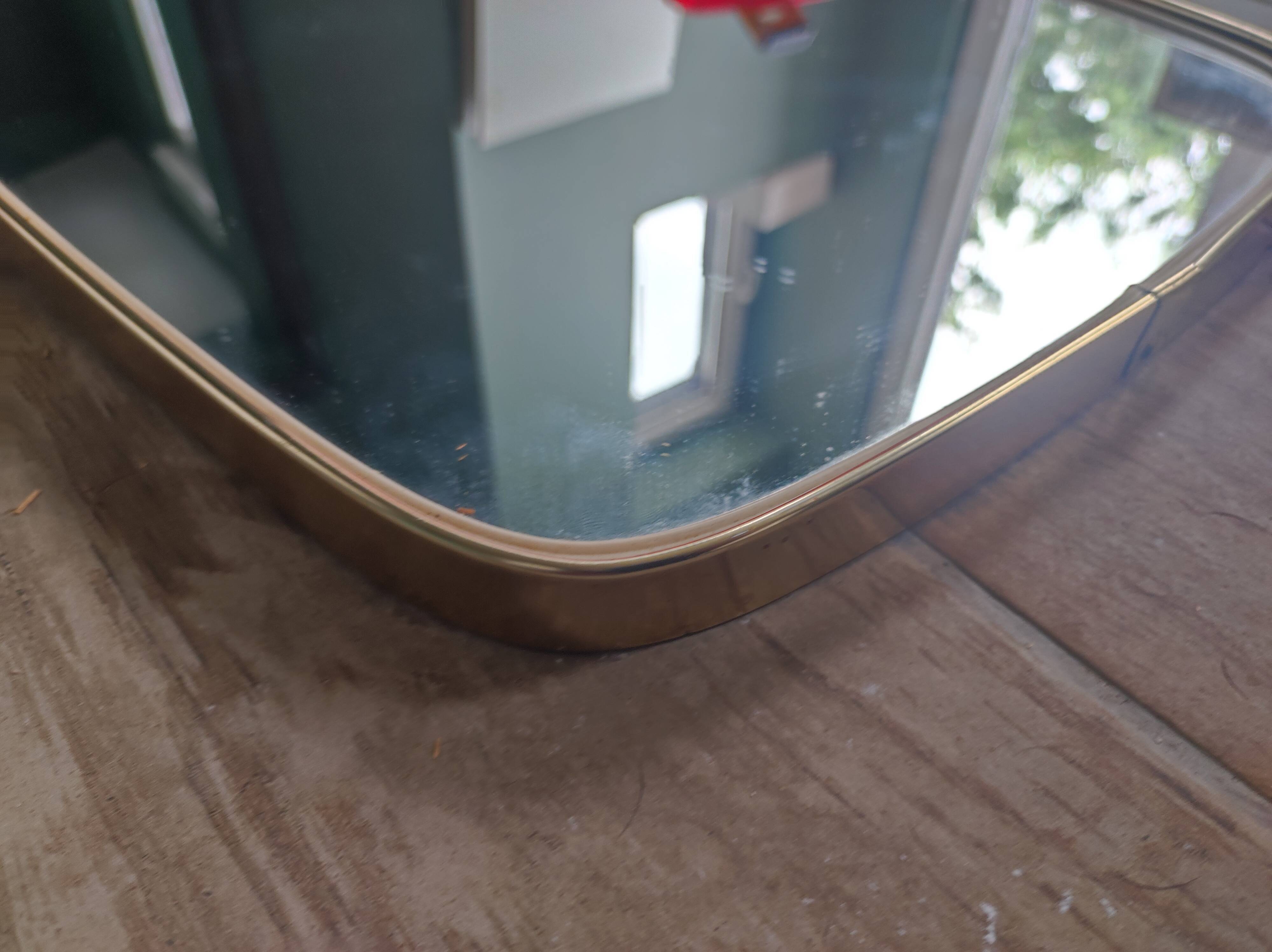 Asymmetrical mirror free-form rearview mirror