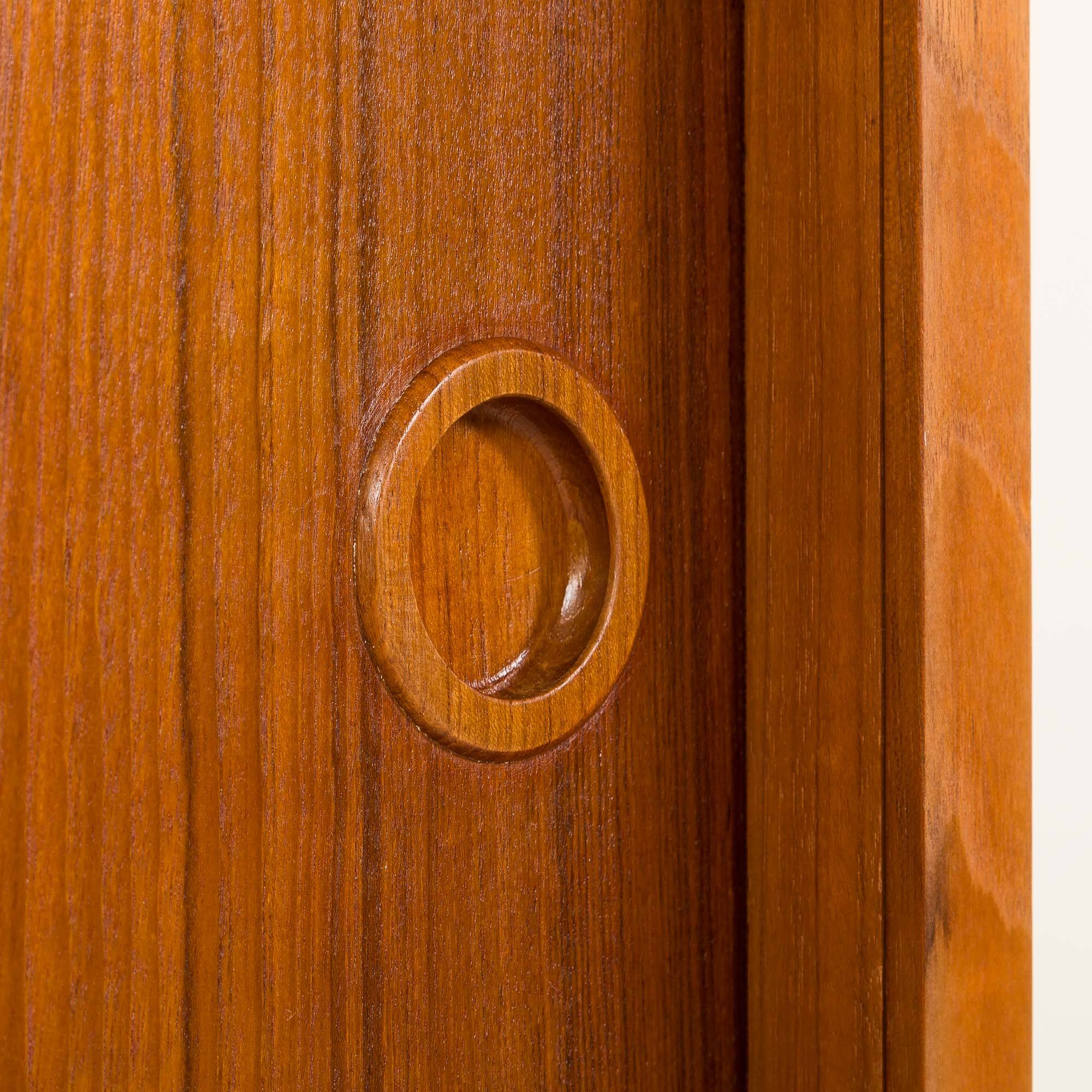 Danish teak wardrobe by Hundevad, 1960s