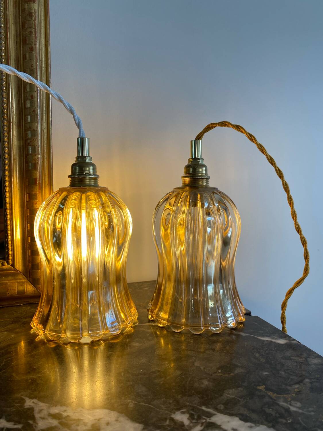 Pair of portable lamps with vintage amber glass globes