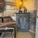 Eighteenth-century corner cabinet with a patina.