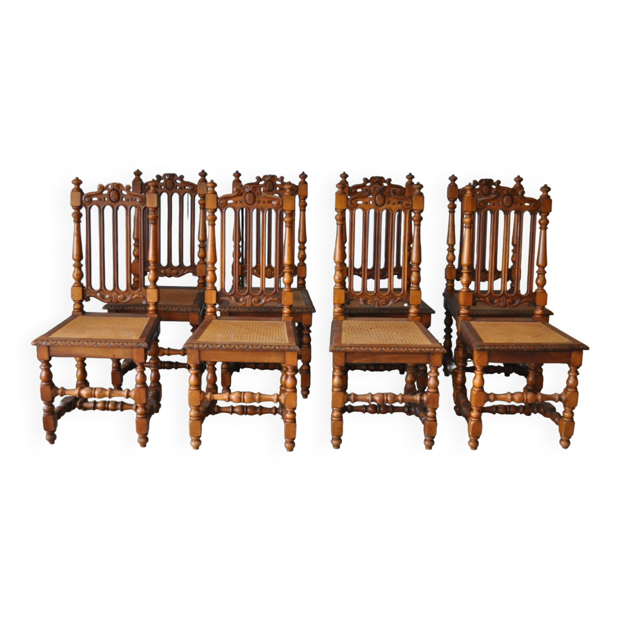 Set of 8 tanned chairs.