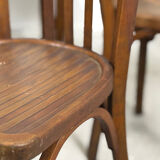 Set of 17 vintage bistro chairs in curved wood — striped seat, be