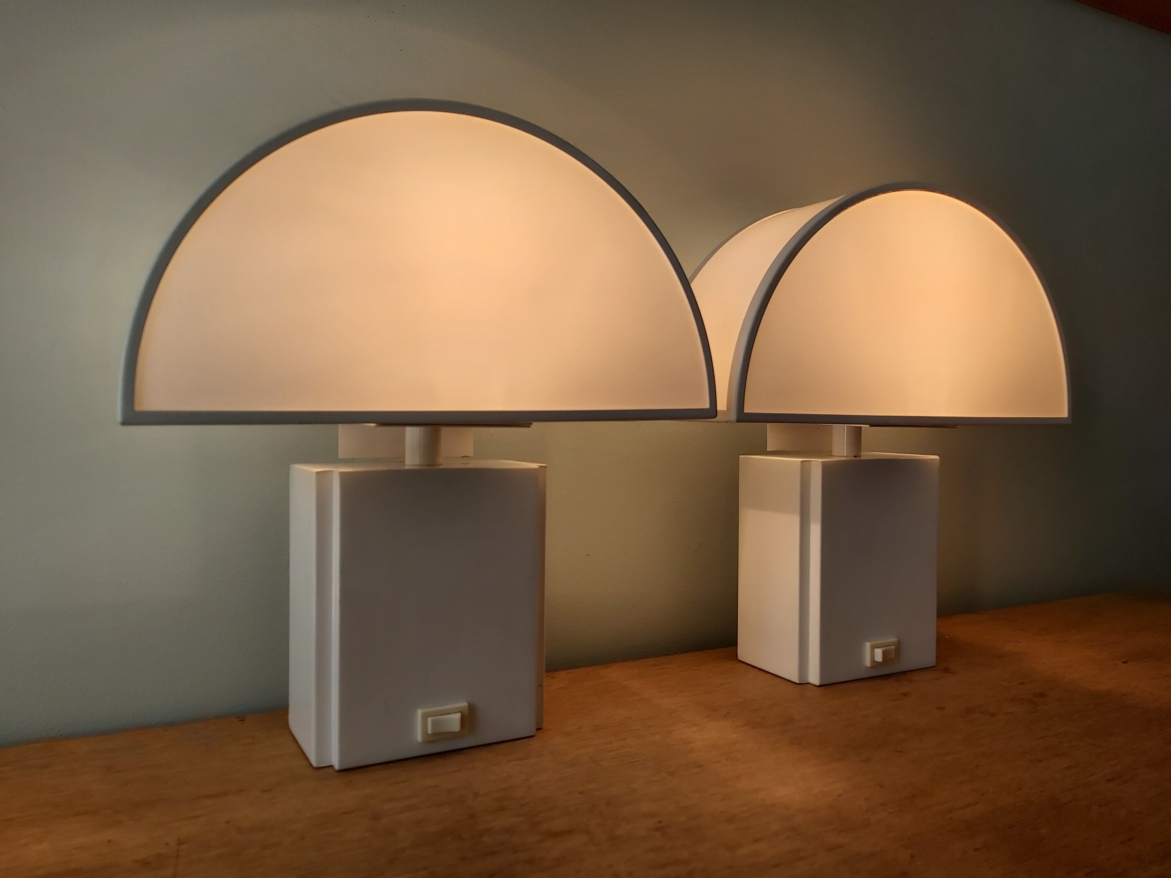 Pair of wall lamps, Olympus model, Harvey Guzzini, 70s