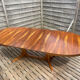 Oval table Baumann, two extensions, rosewood top.