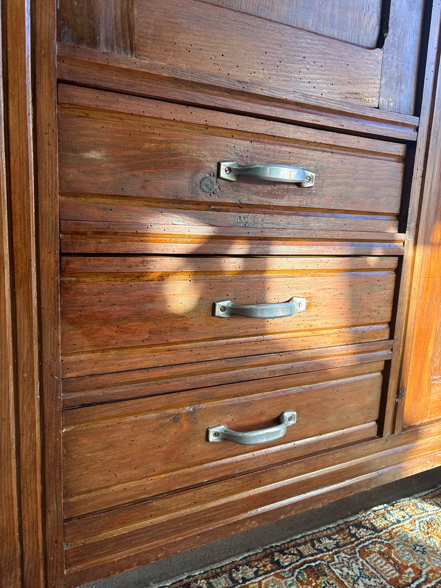 Antique Parisian wardrobe with mirror, hanging space and drawers.