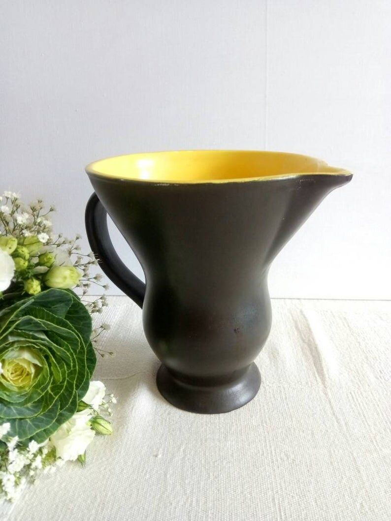 Old black and yellow black and yellow Digoin earthenware pitcher or pitcher