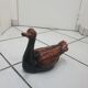 Large brown and black duck