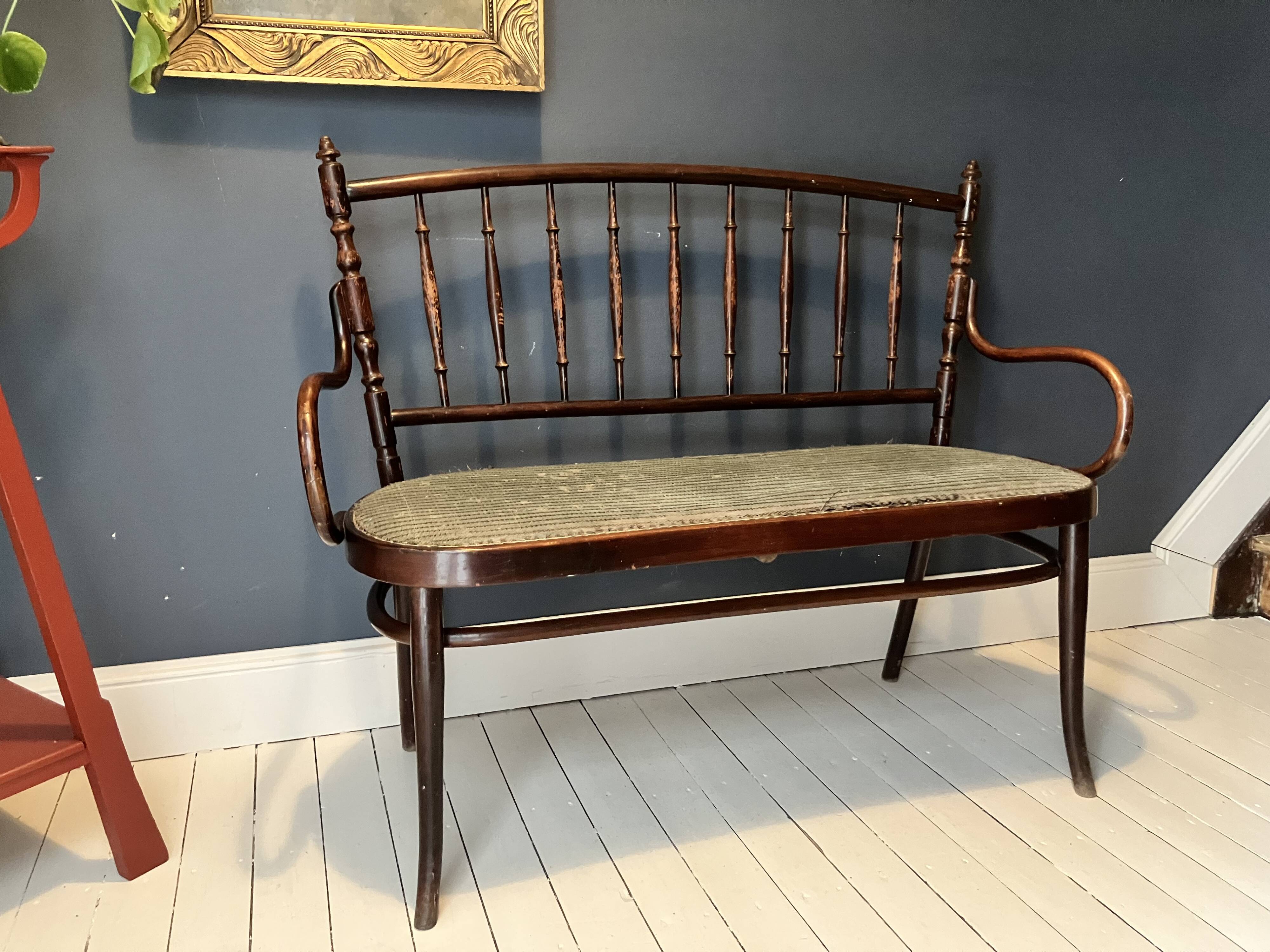 Thonet-branded bistro-style bench in turned wood, velvet and caning
