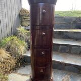 Cylindrical column with 4 drawers, in solid wood.