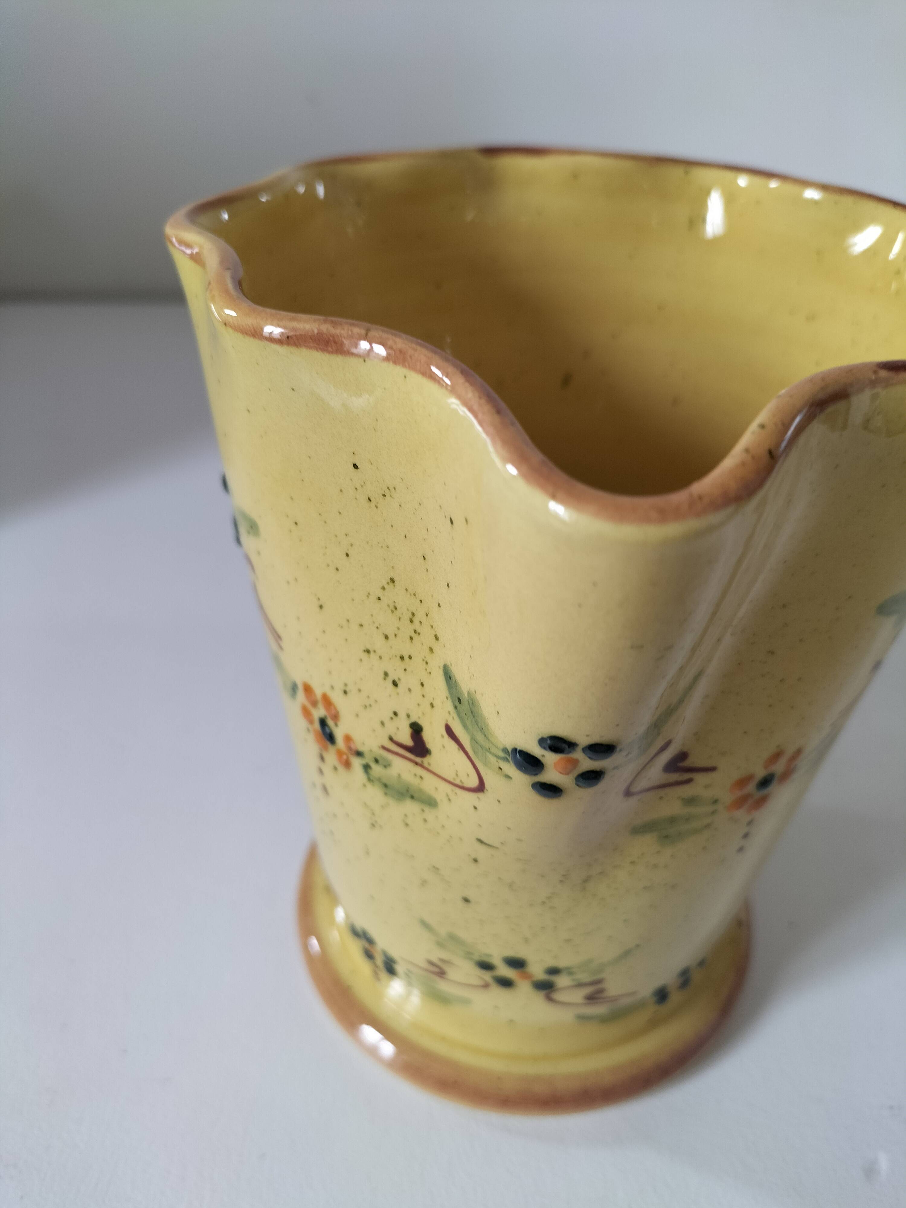 JP Daniel handmade earthenware pitcher – floral decoration on a yellow background