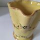 JP Daniel handmade earthenware pitcher – floral decoration on a yellow background