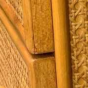 Dresser and its bedside table in rattan caning and vintage oak from the 1970s.
