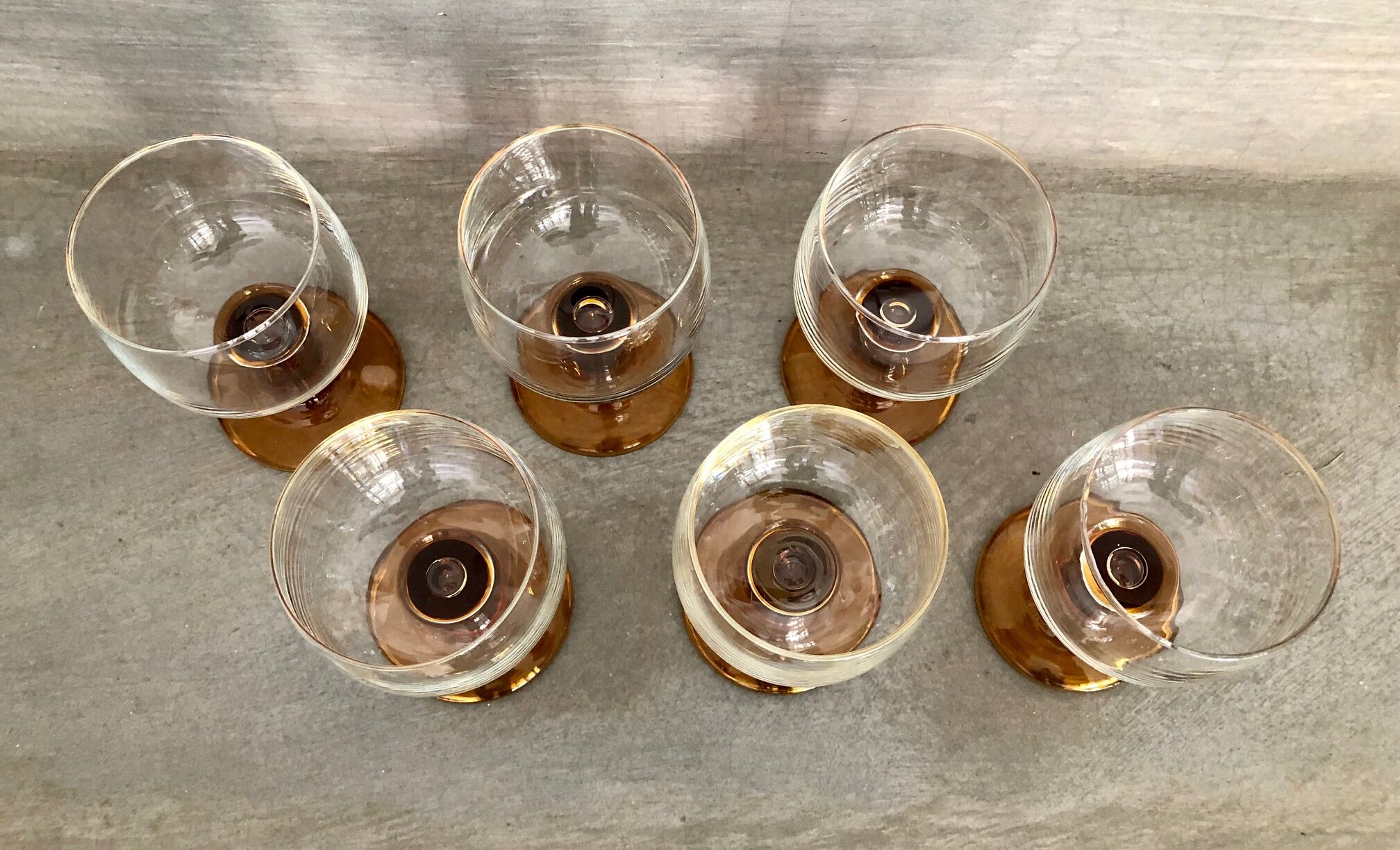 6 Amber stemmed glasses an'70