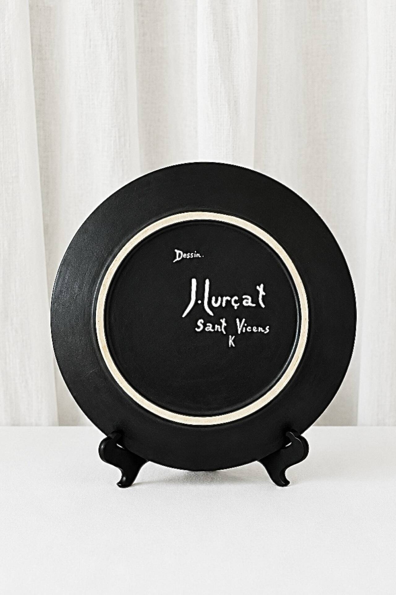 Large ceramic plate J. Lurçat with zoomorphic decoration in black on a white background.