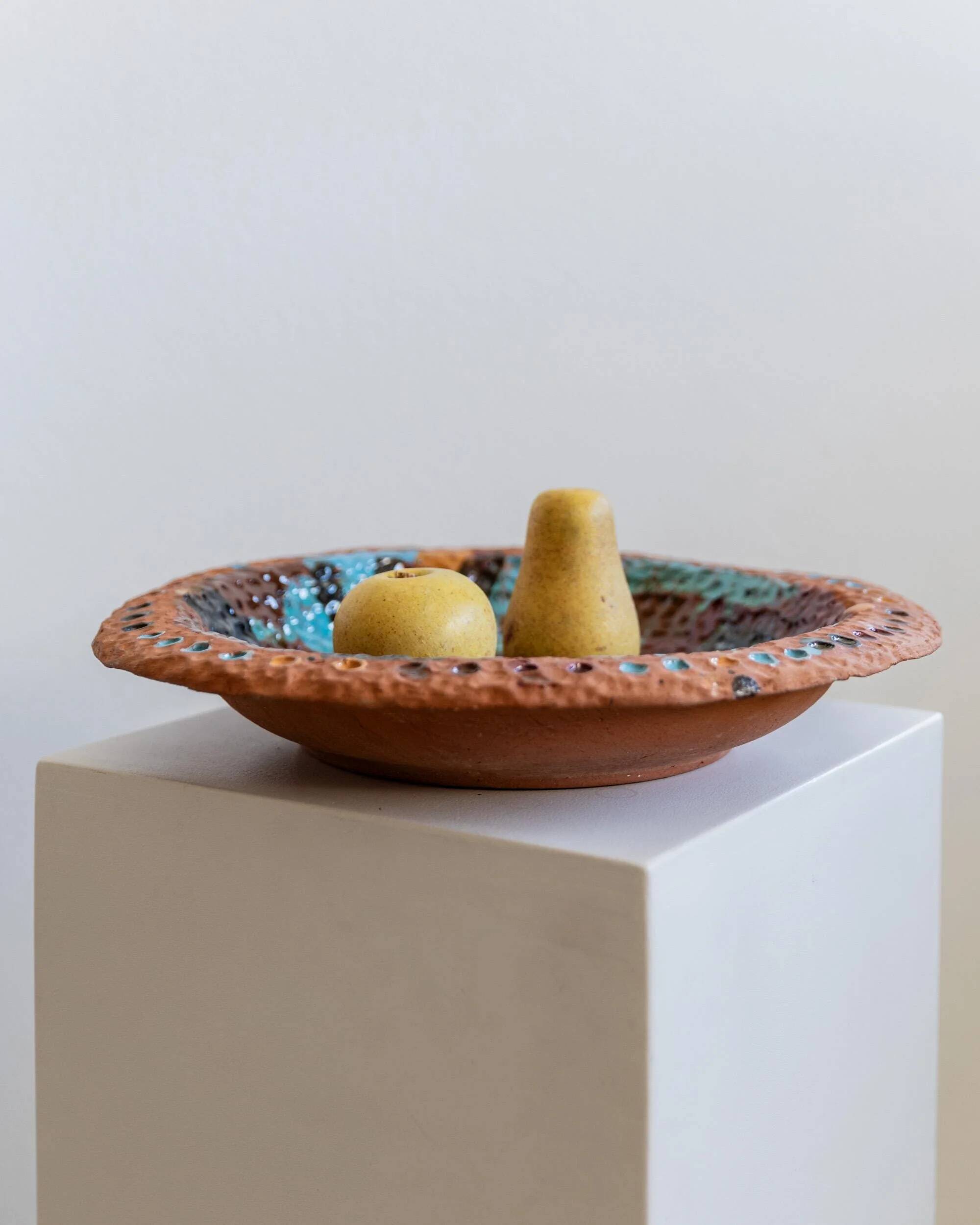 Vintage 1970s ceramic workshop bowl, naive handcrafted shape with coloured glaze, terracotta fruit bowl or wall plate, elegant gift idea.