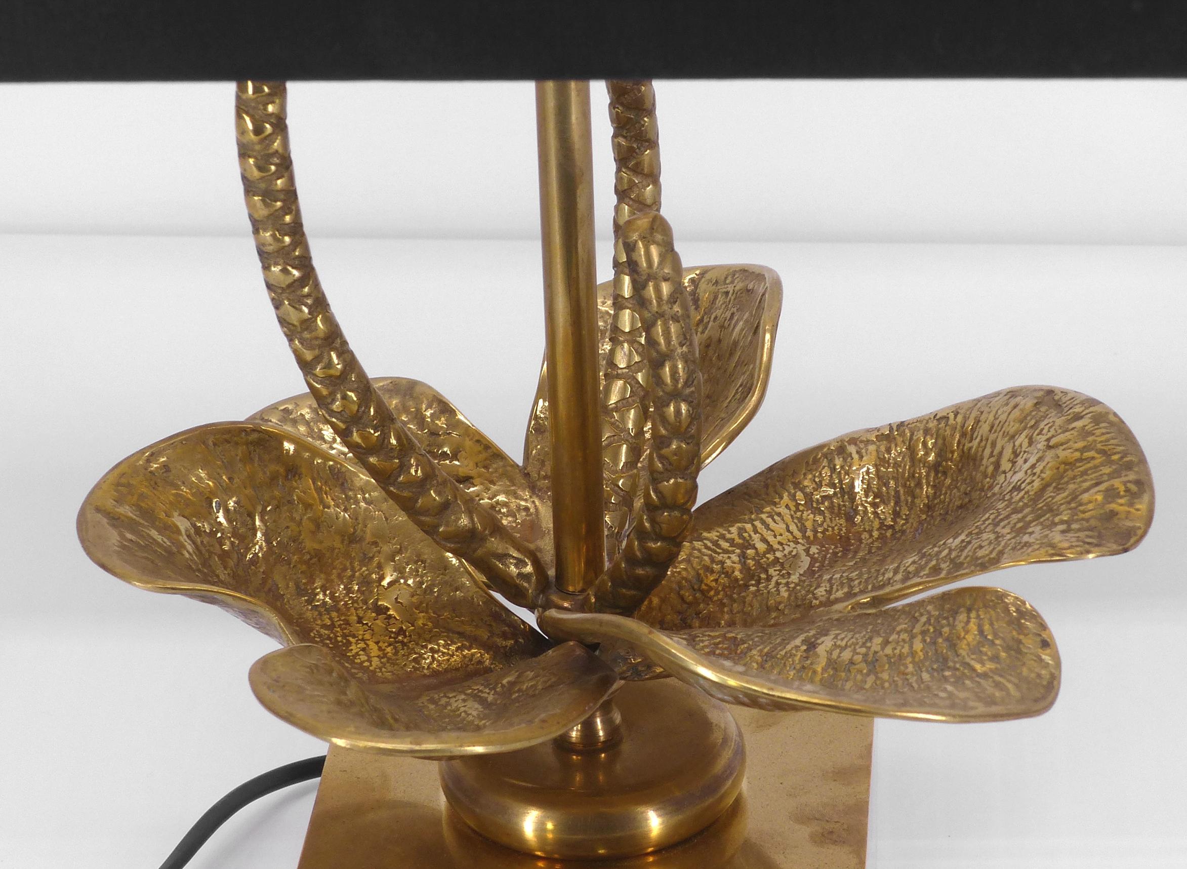 Stylized flower lamp in gilded brass