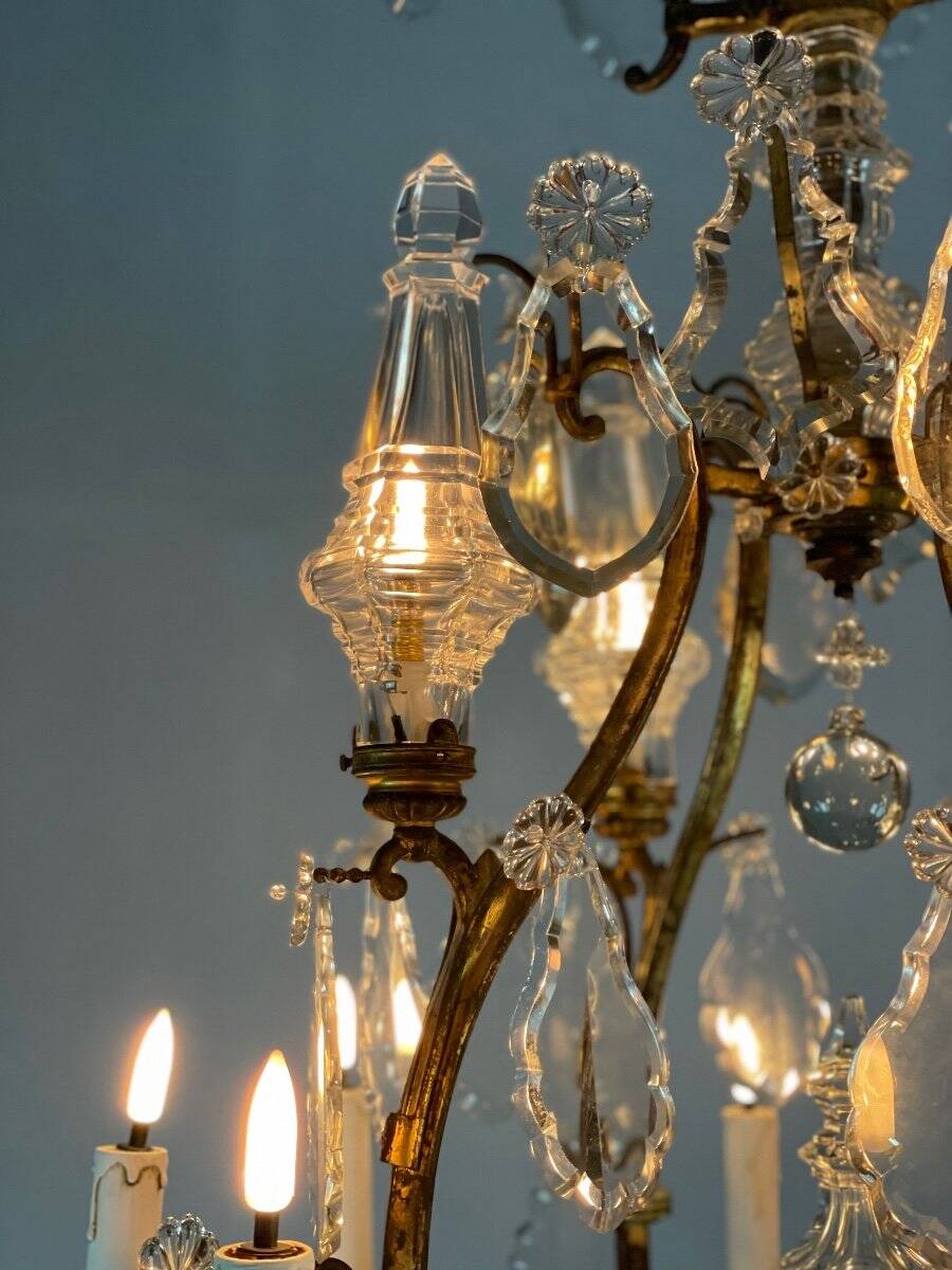 Bronze cage chandelier adorned with cut crystal pendants, 12 lights