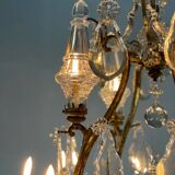 Bronze cage chandelier adorned with cut crystal pendants, 12 lights
