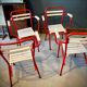 Four TOLIX chairs with armrests