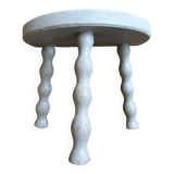 Small tripod stool in gray wood