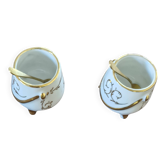 Vintage porcelain salt and pepper shakers.