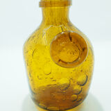 Yellow glass carafe with bubble details