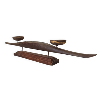 Vintage chandelier in solid carved teak.