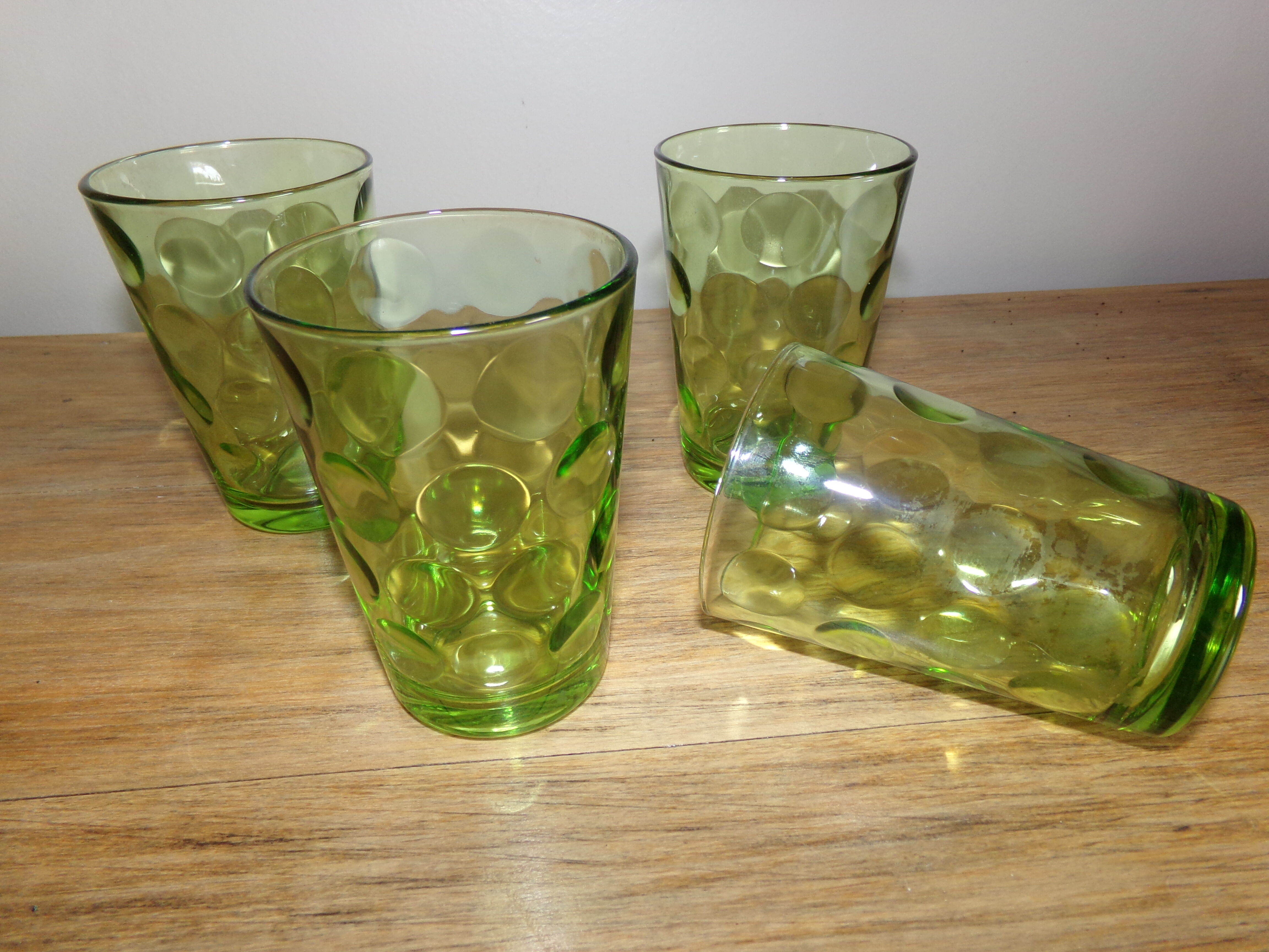 4 old green glasses
