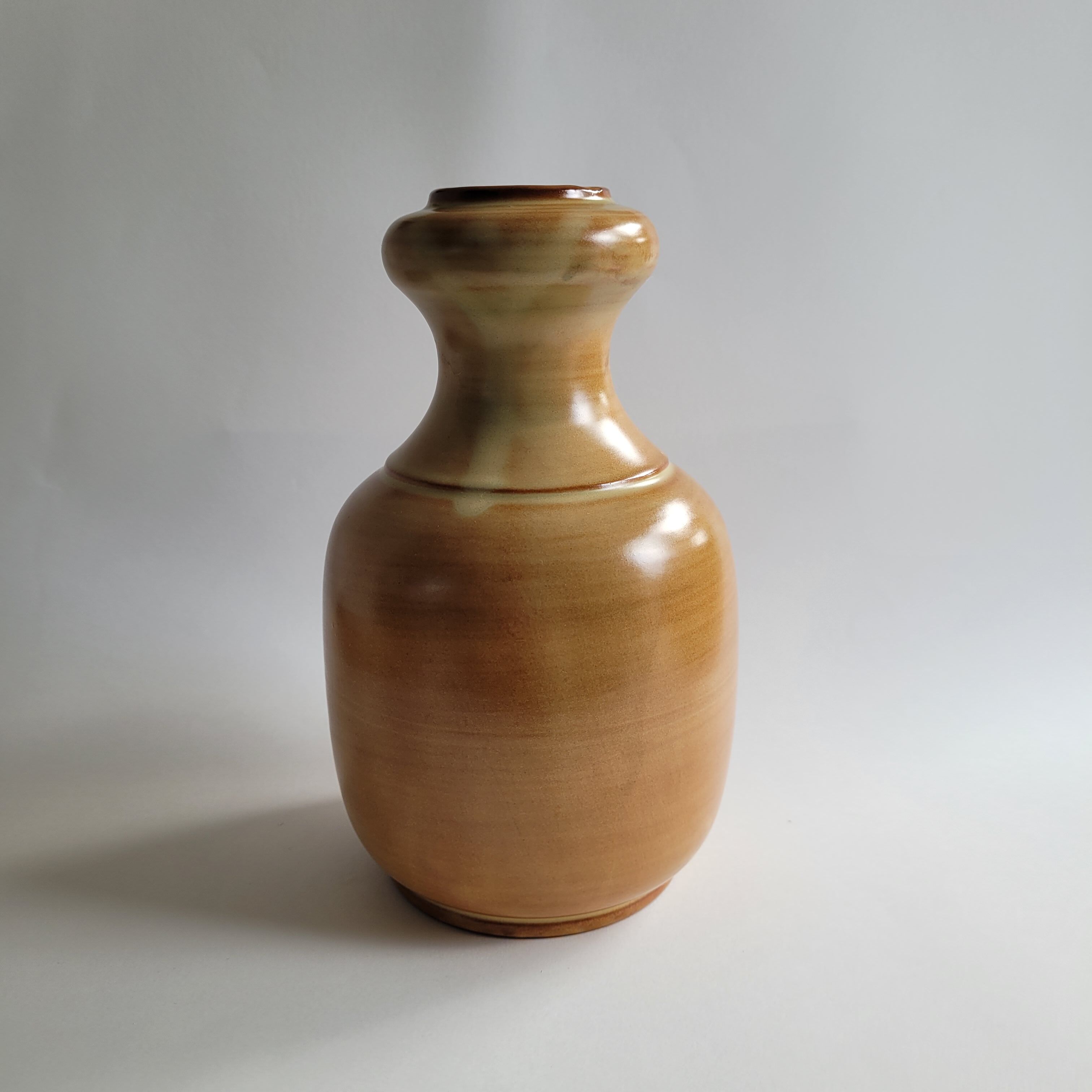 Enamelled sandstone vase