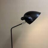 Black metal tripod floor lamp