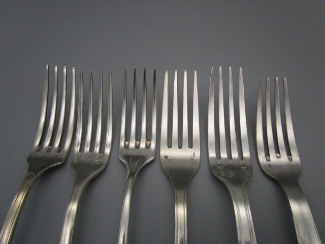 6 antique silver metal forks mismatched for a chic table