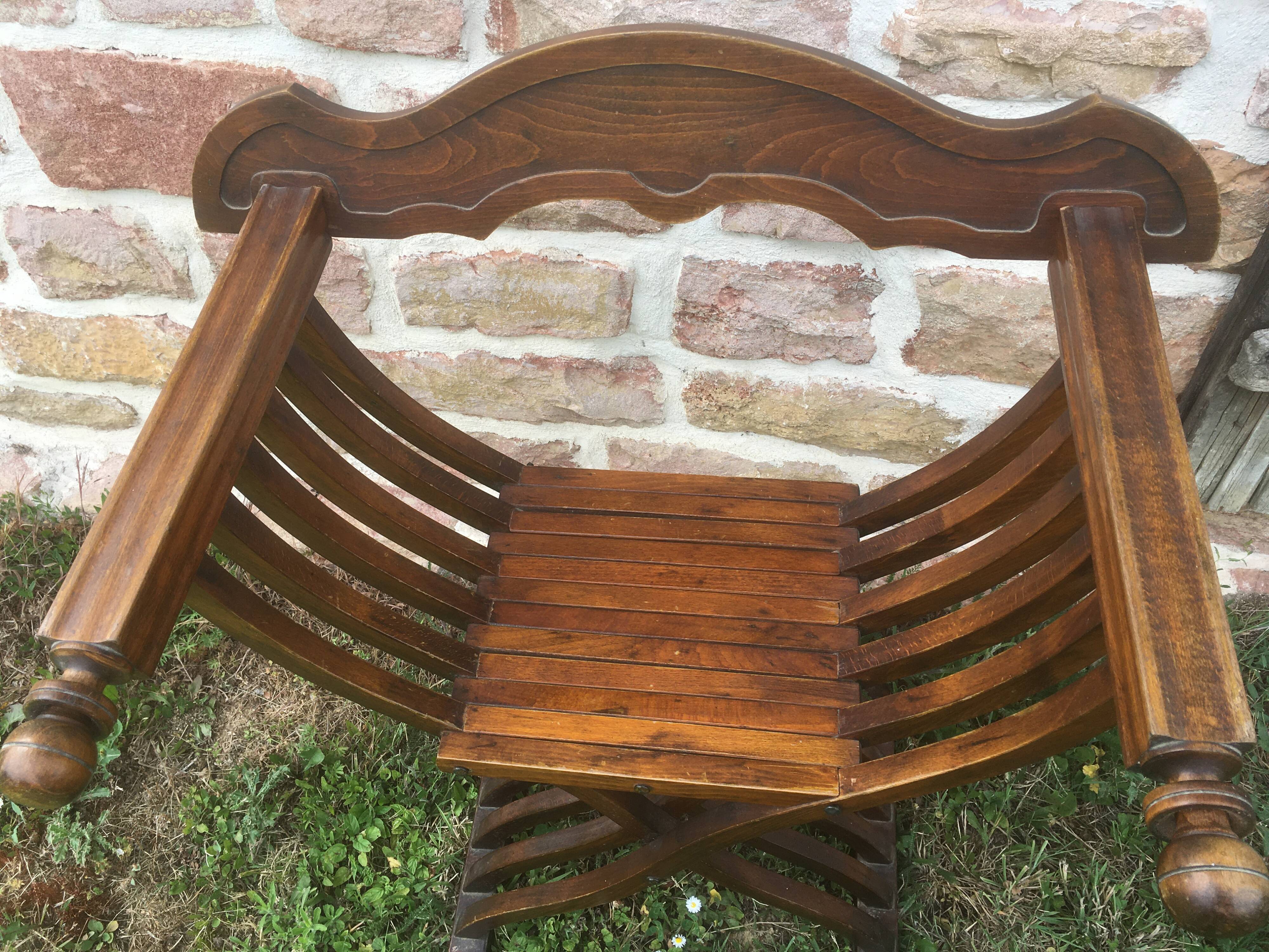 Dagobert armchair or folding walnut curule