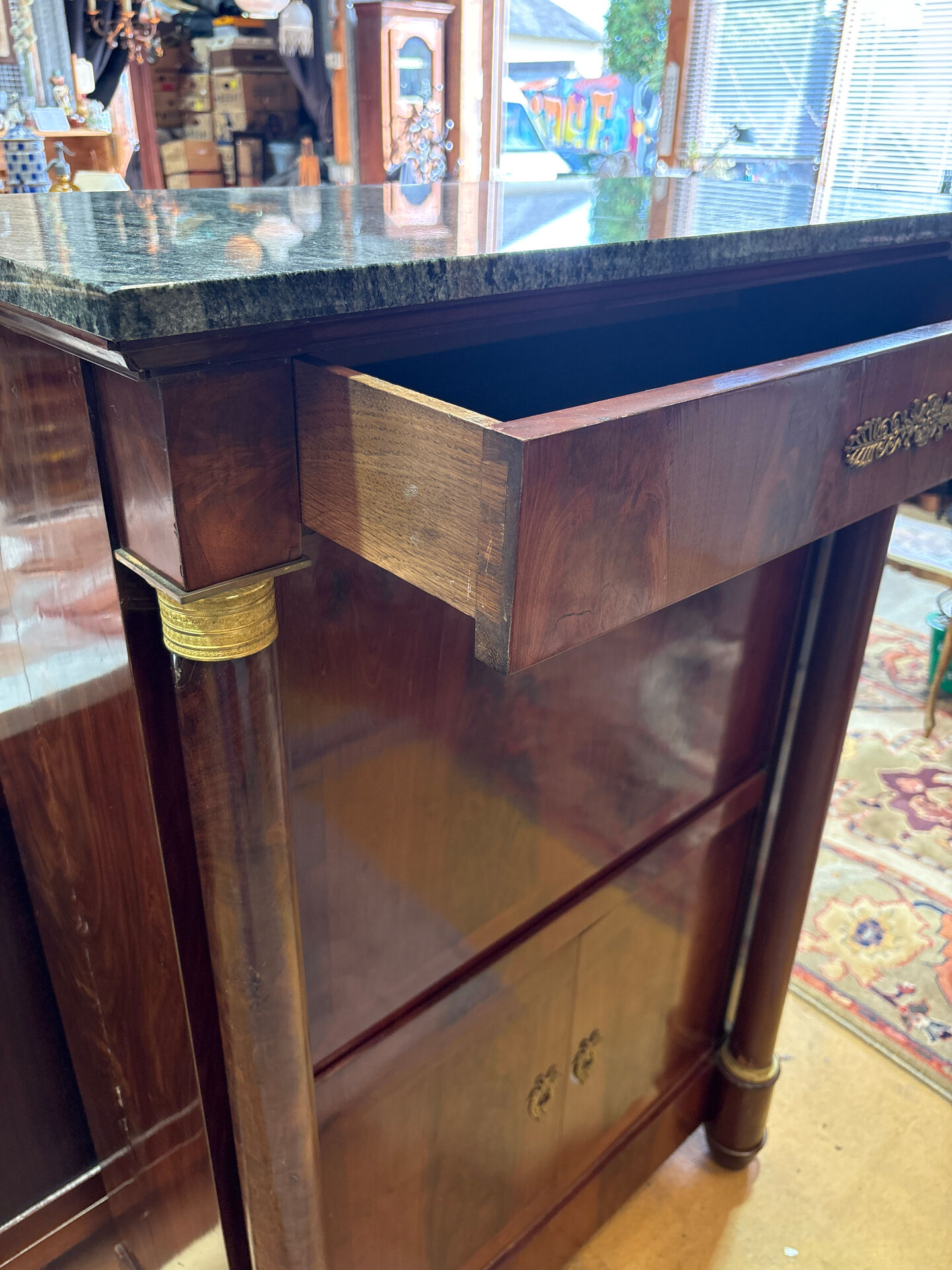 Empire secretary in mahogany, bronze and marble with secret drawers.
