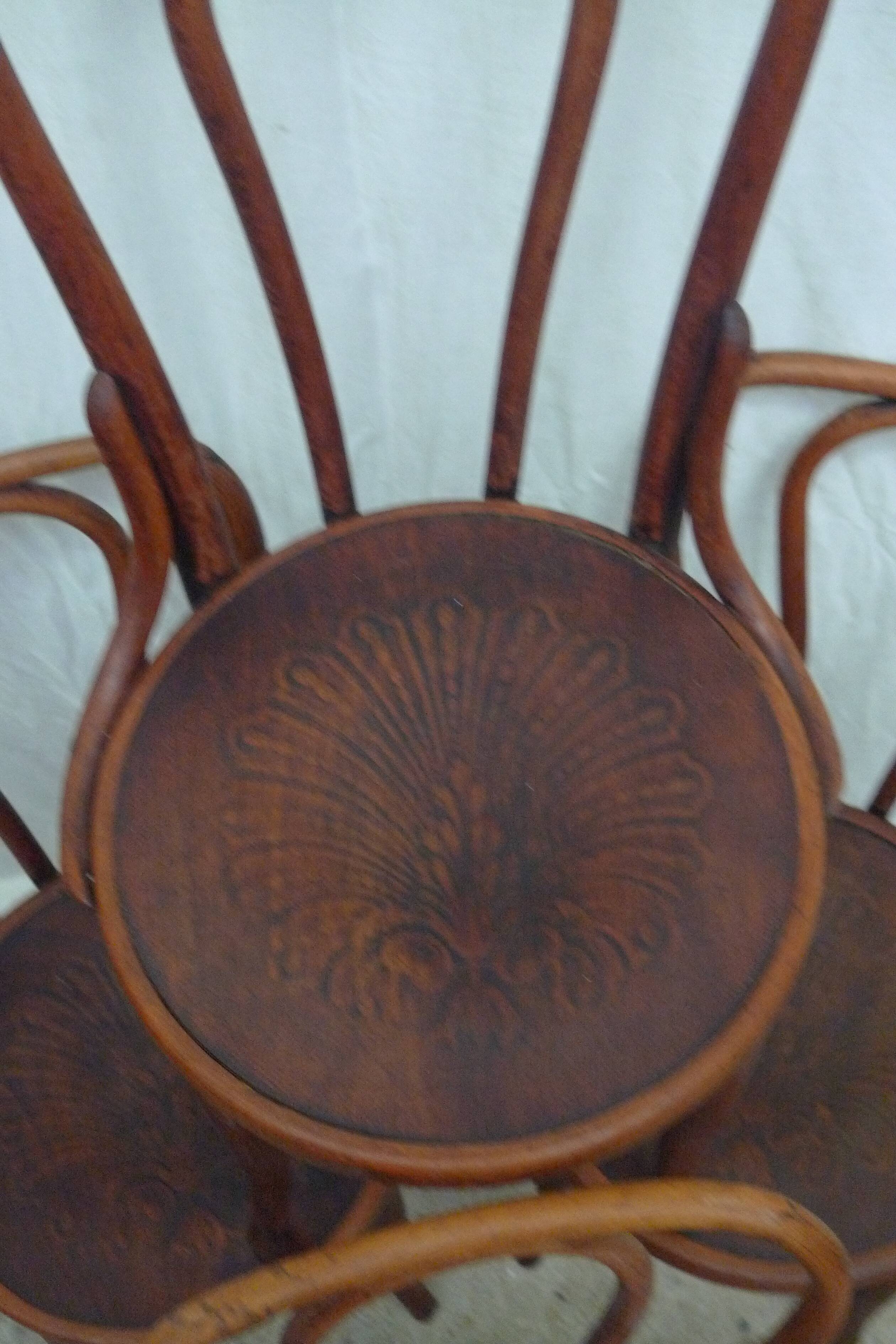 Set of four Jacob Kohn chairs.