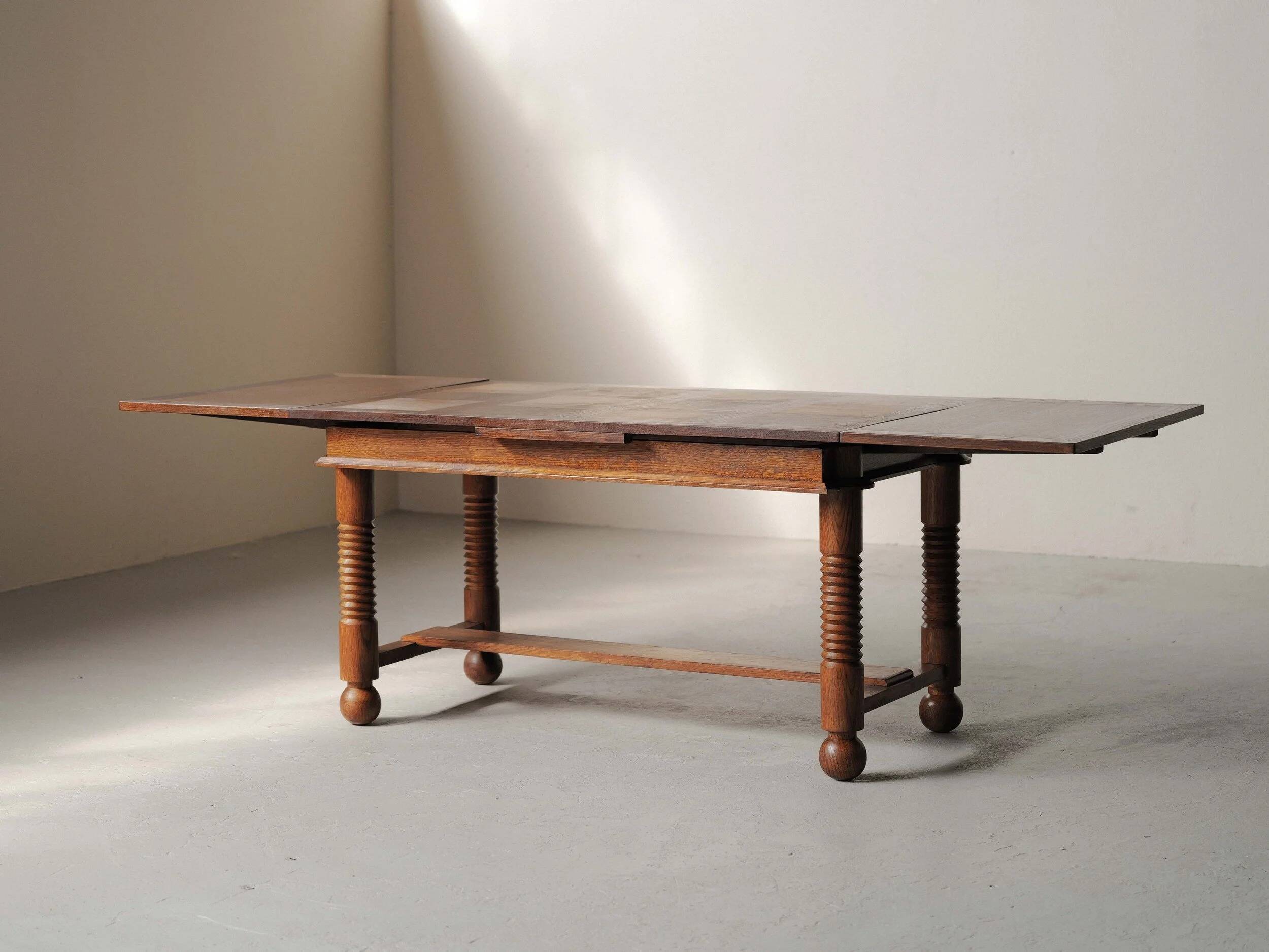 Modernist oak dining table, France, 1940–1950