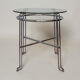 Chrome metal and glass tubular table
