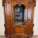 Louis XV Provençal style bookcase in half-moon shape in cherry wood circa 1930