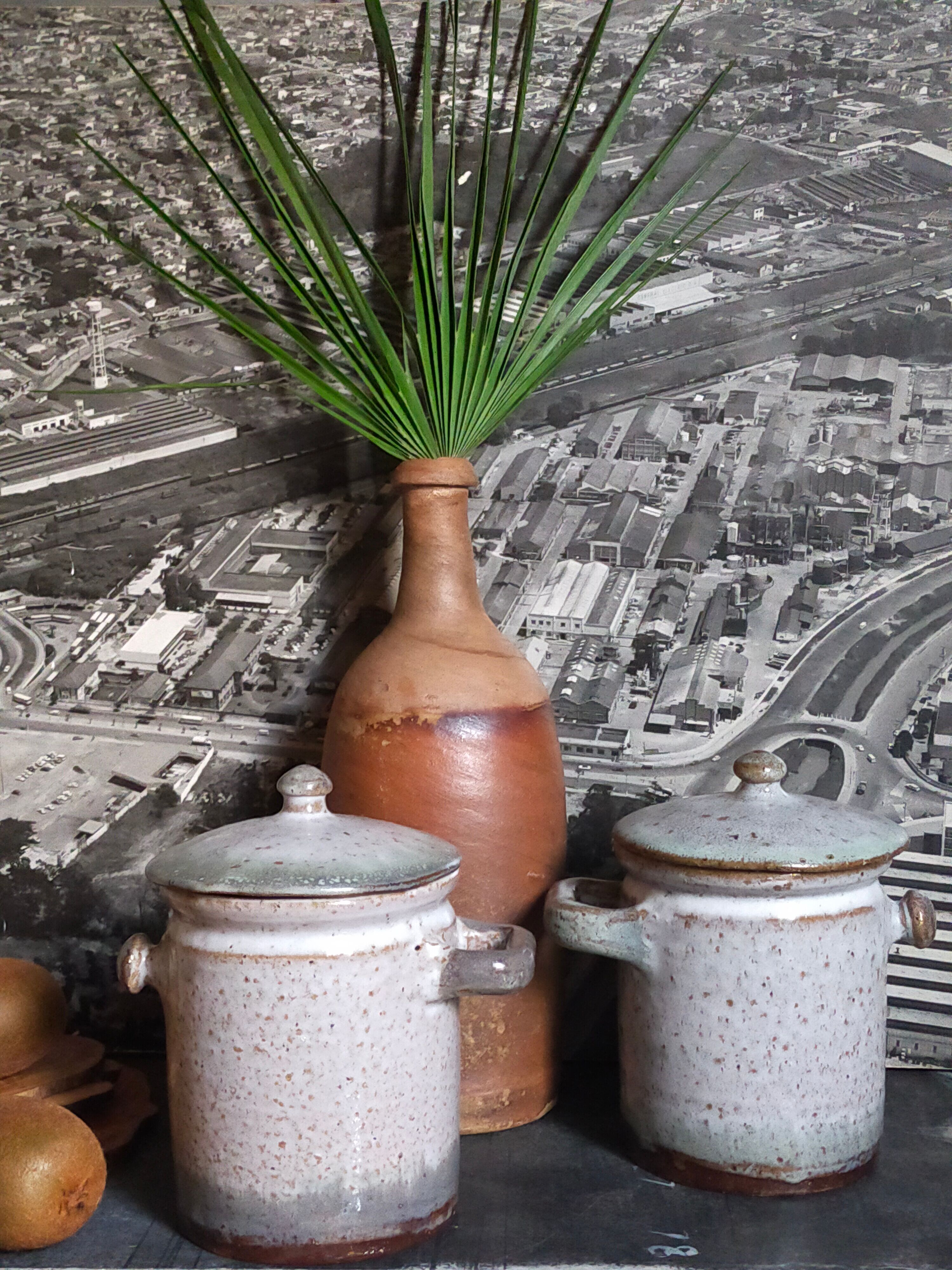 Duo of potter's pots covered in vintage glazed stoneware