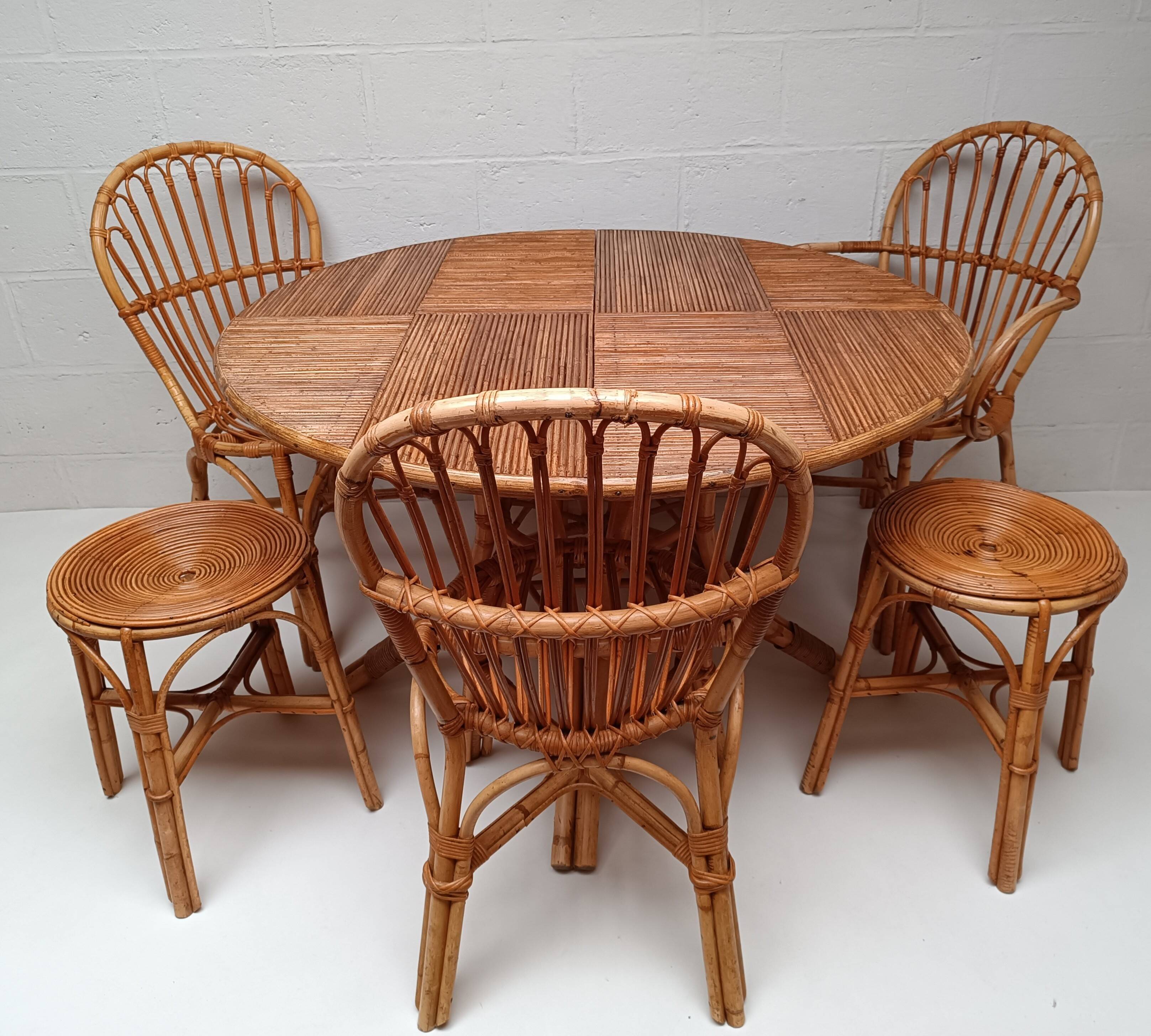 Bamboo table with extensions, 3 chairs and 3 stools from the 1960s.