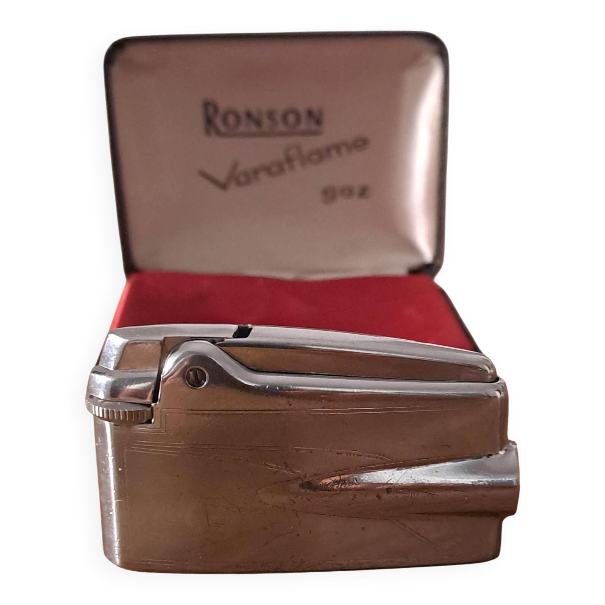 Vintage Ronson Varaflame chrome lighter and its original case.
