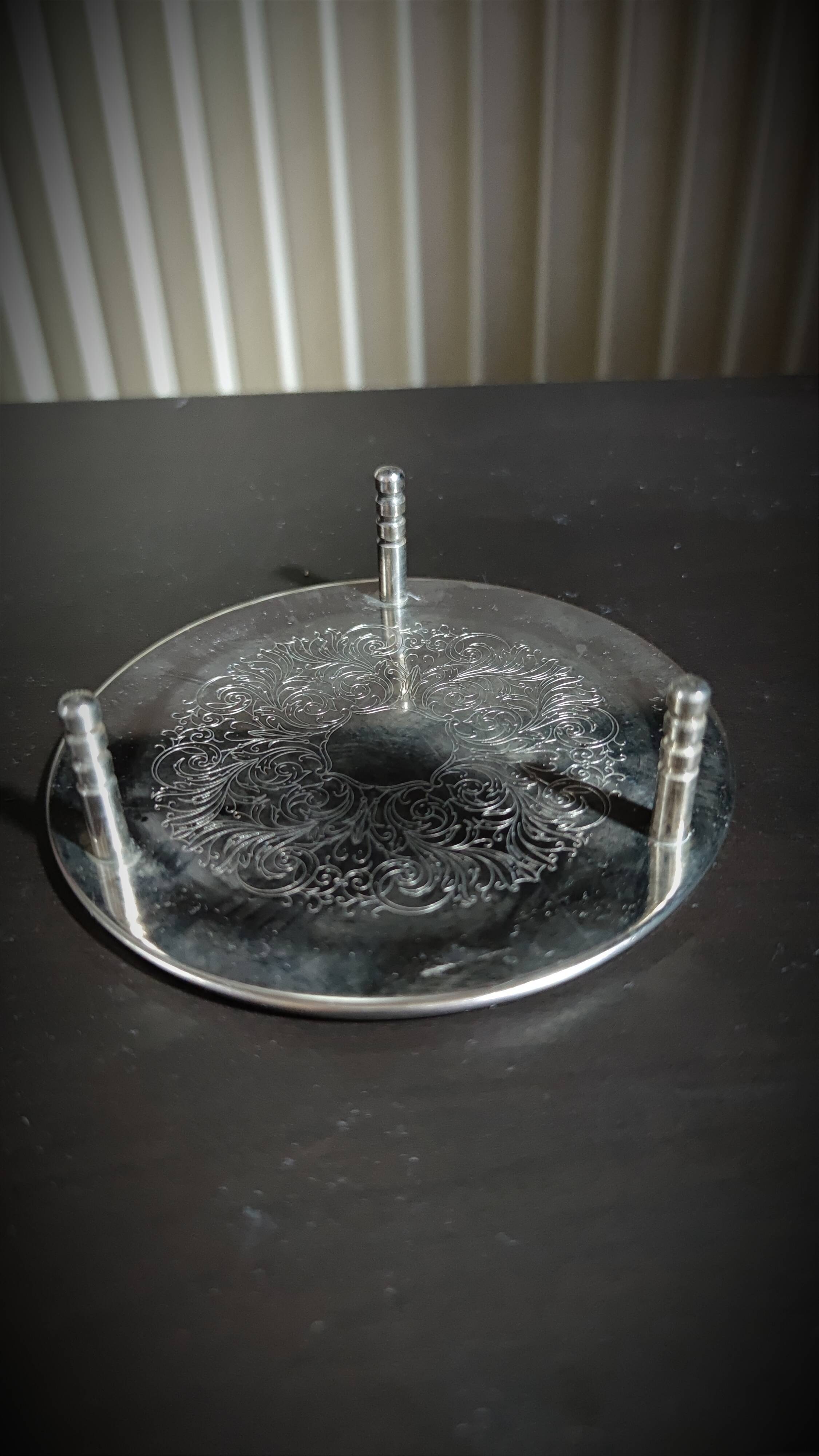 Dessous de verre en métal argenté
